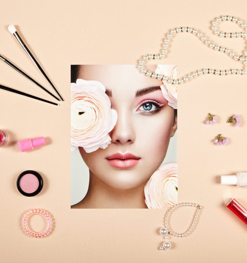 Fashion lady accessories collage. Falt Lay. Beauty photography. Make-Up brushes. Jewelry and nail polish. Portrait of beautiful young woman with flowers